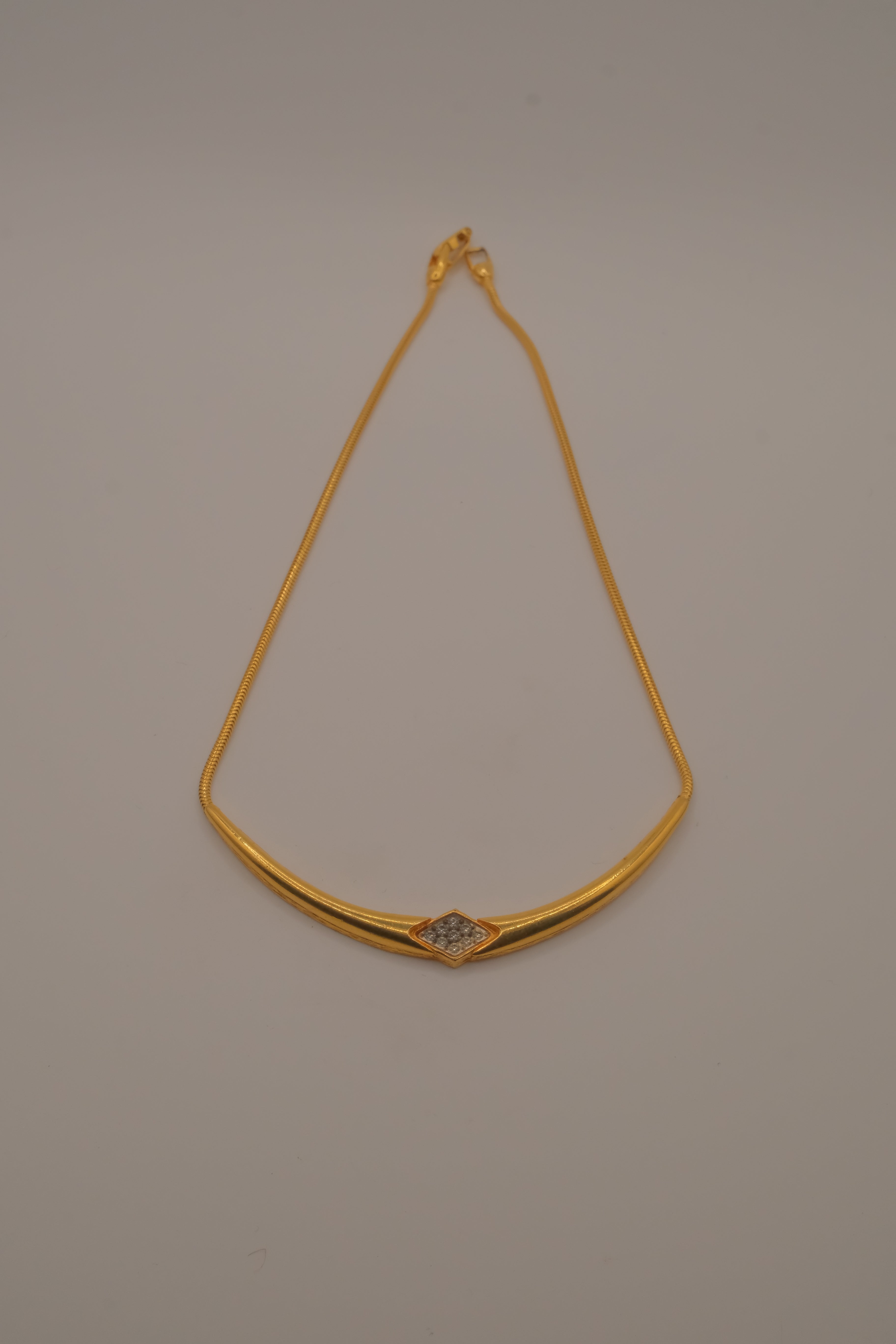 Vintage gold-toned rigid center necklace