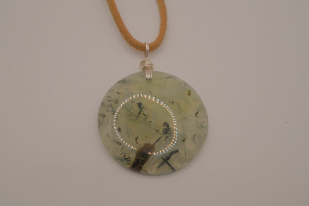 Natural prehnite pendant on leather cord