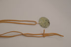 Natural prehnite pendant on leather cord