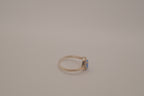 Sterling silver oval opal ring with a curved accent band
