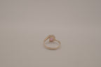 Sterling silver oval opal ring with a curved accent band
