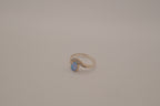 Sterling silver oval opal ring with a curved accent band