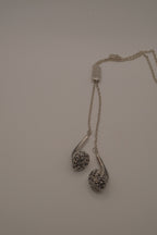 Novelty headphone or earbud-shaped pendant necklace