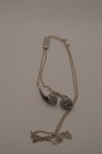 Novelty headphone or earbud-shaped pendant necklace
