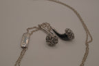 Novelty headphone or earbud-shaped pendant necklace