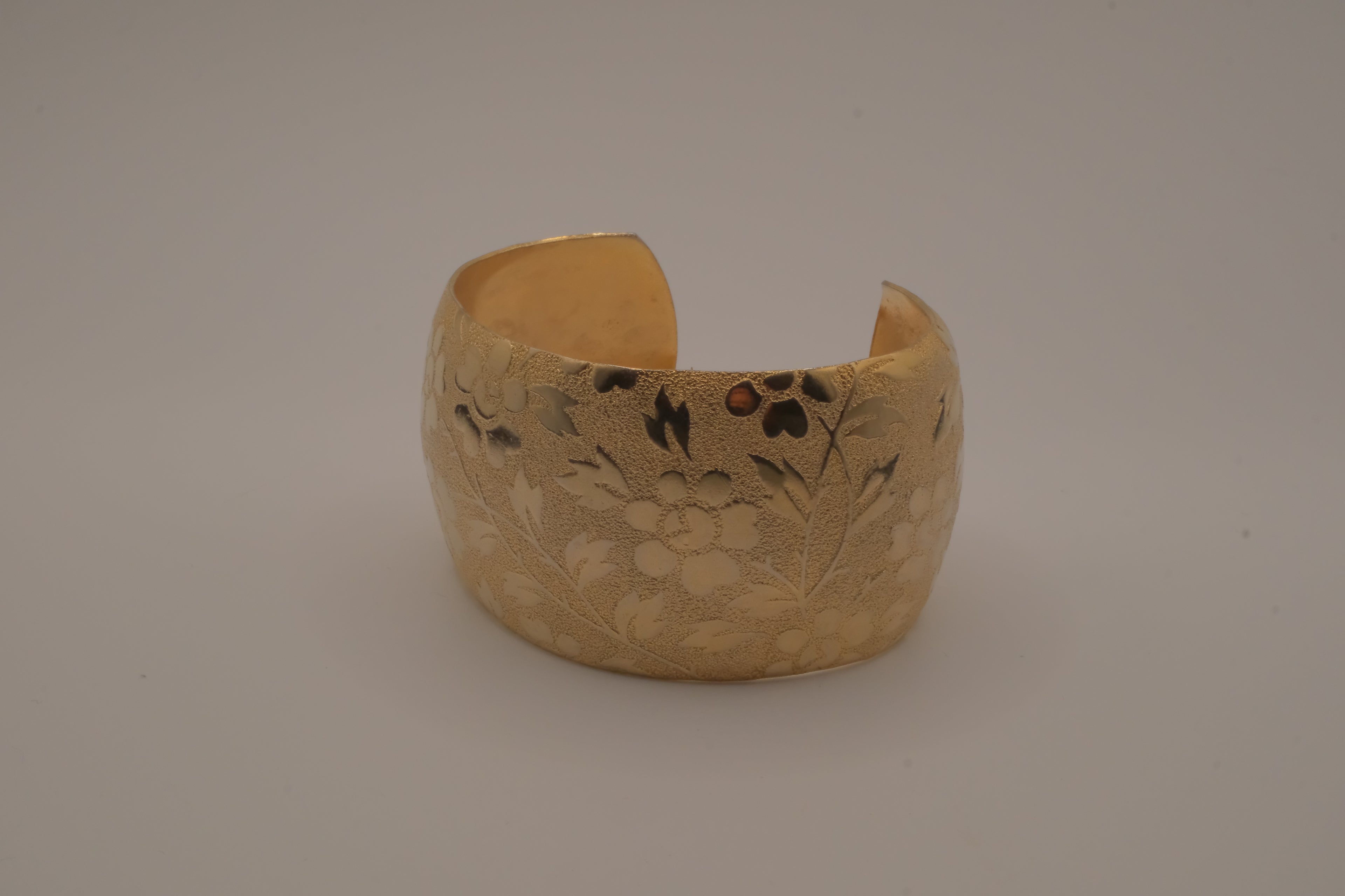 Vintage gold-toned floral engraved cuff bracelet
