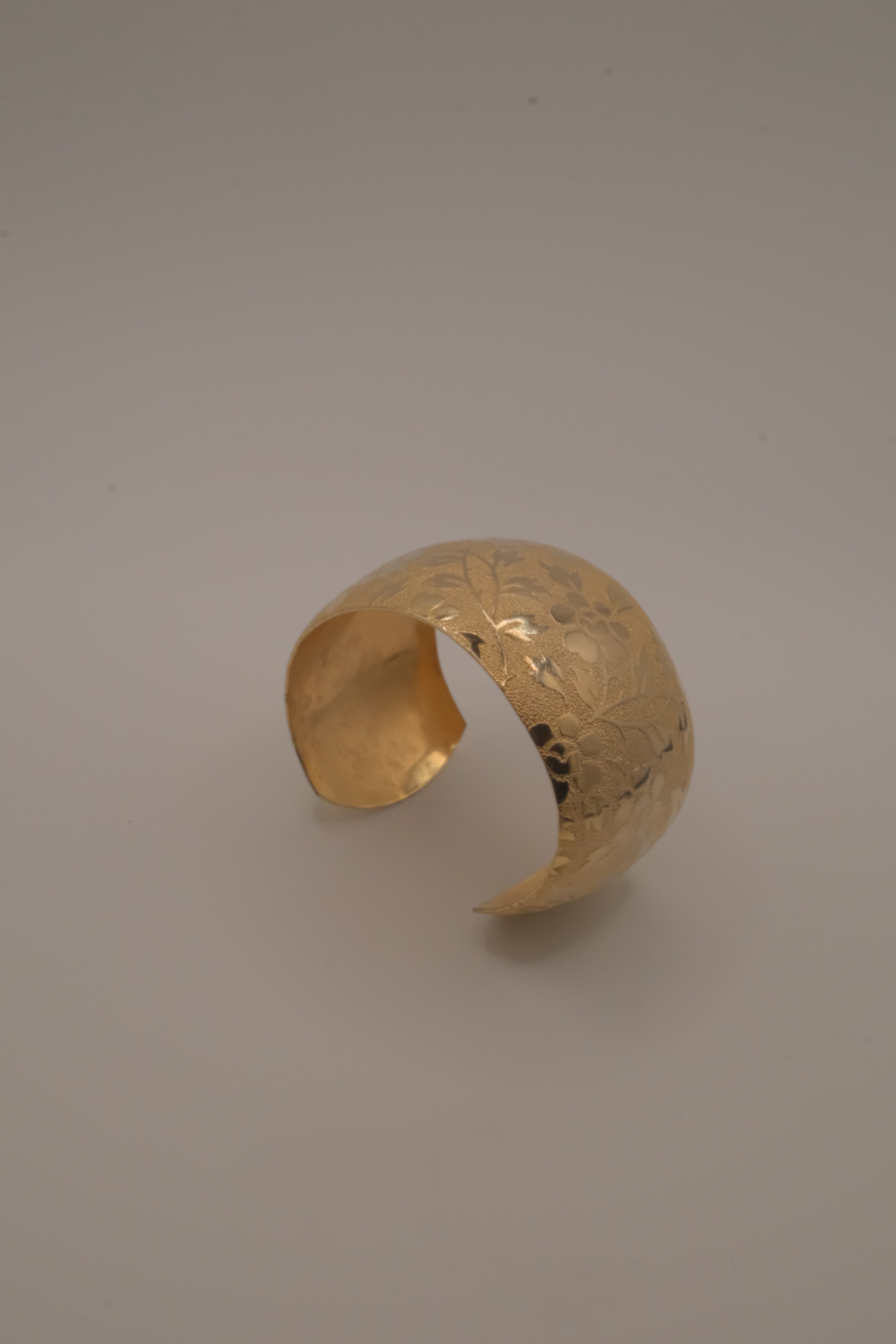 Vintage gold-toned floral engraved cuff bracelet