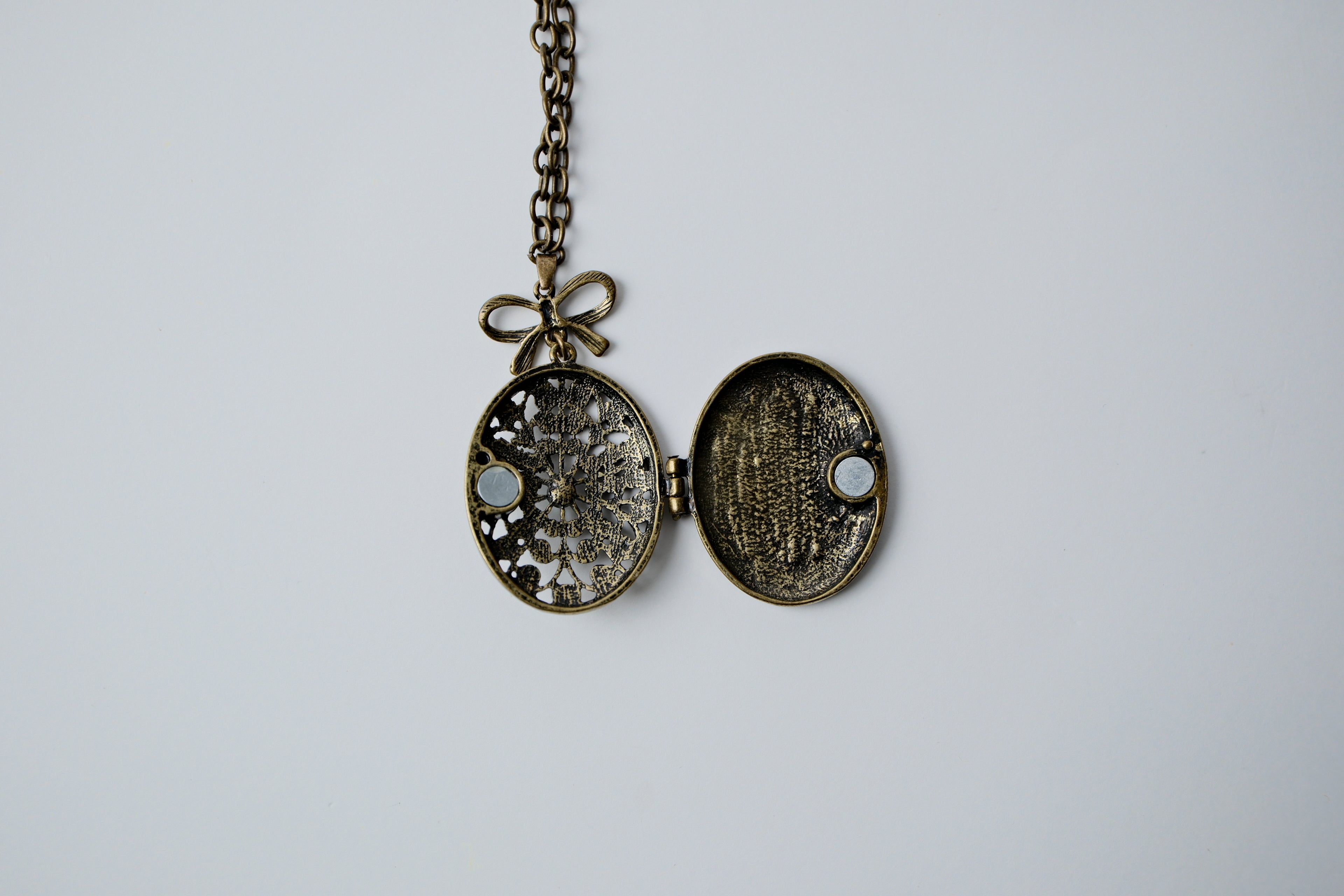 Vintage Bronze Bow Locket Necklace