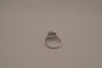 Cushion-cut blue stone halo ring