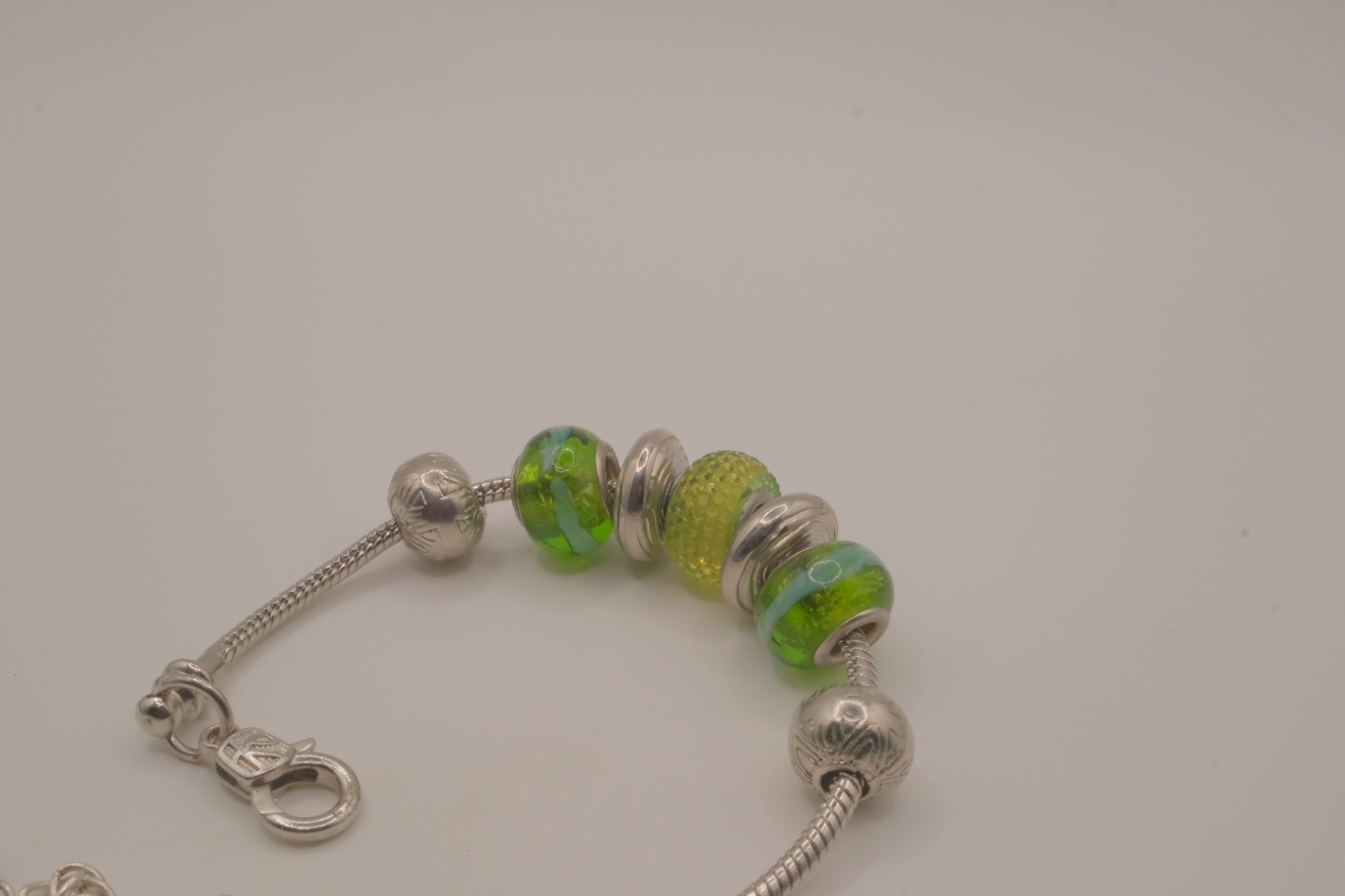 Pandora style vibrant green charm bracelet