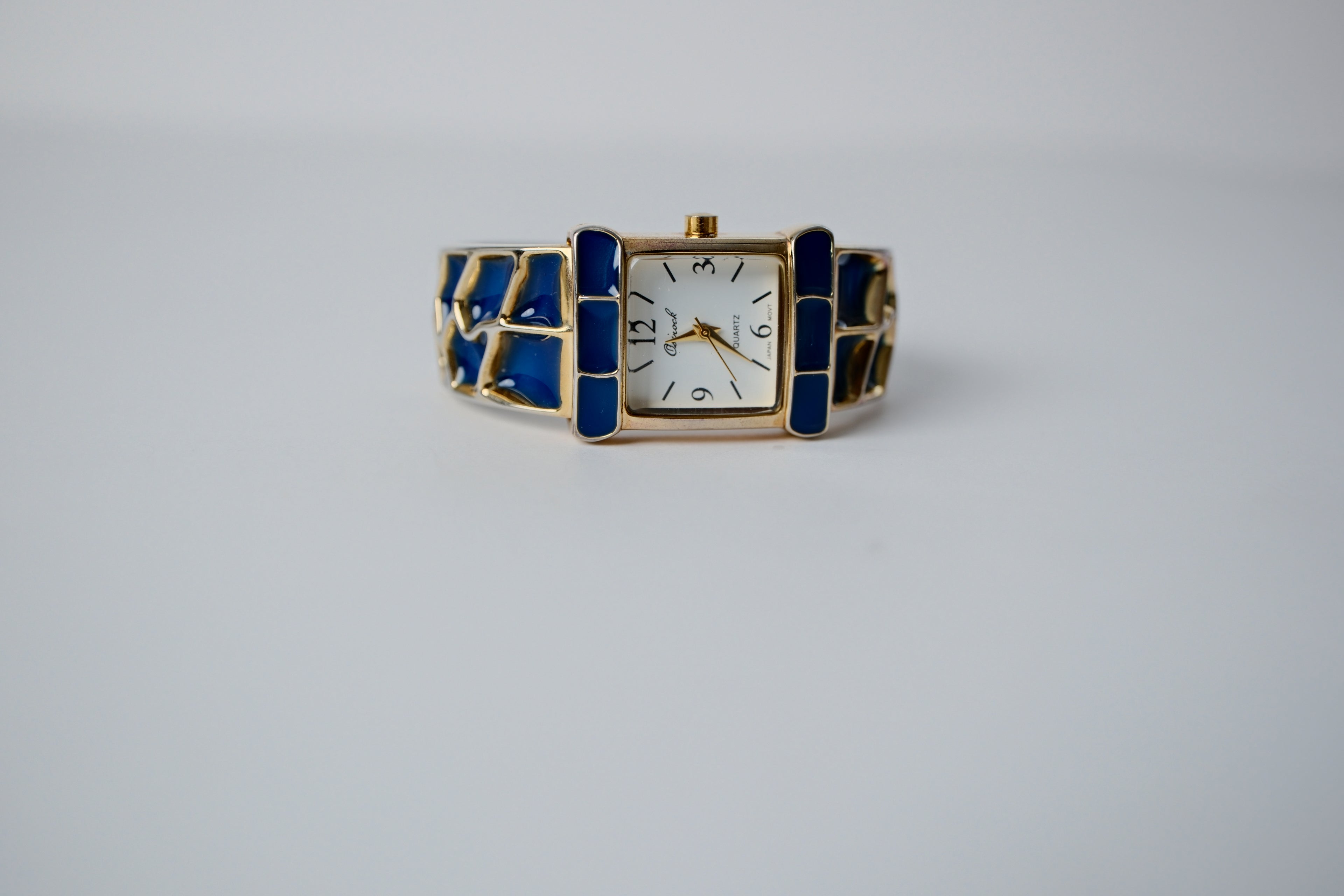 Vintage Joan Rivers Blue and Gold Bangle Watch