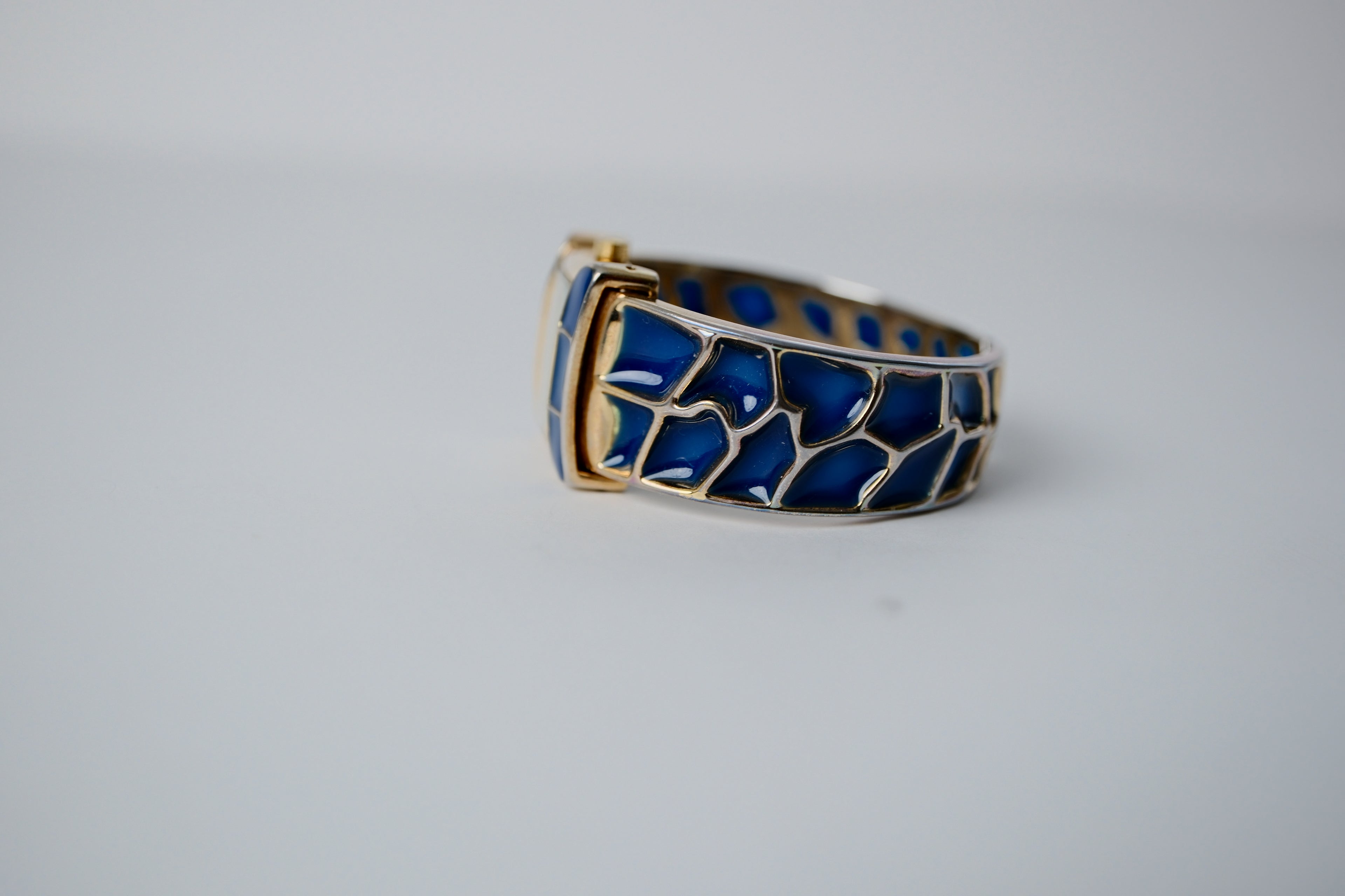 Vintage Joan Rivers Blue and Gold Bangle Watch