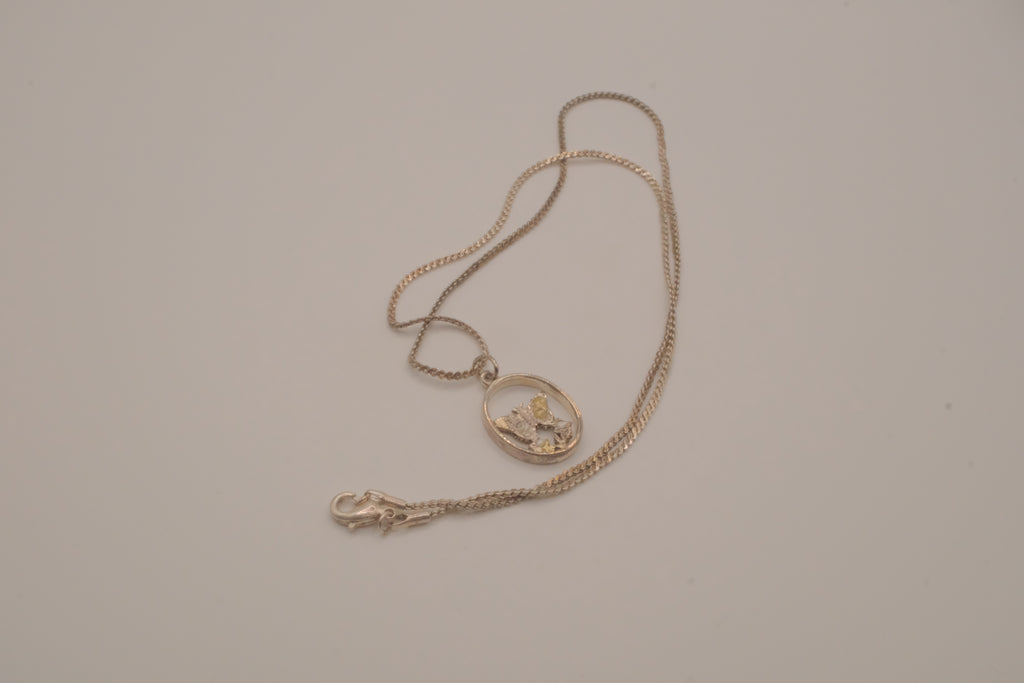 Butterfly circular pendant necklace