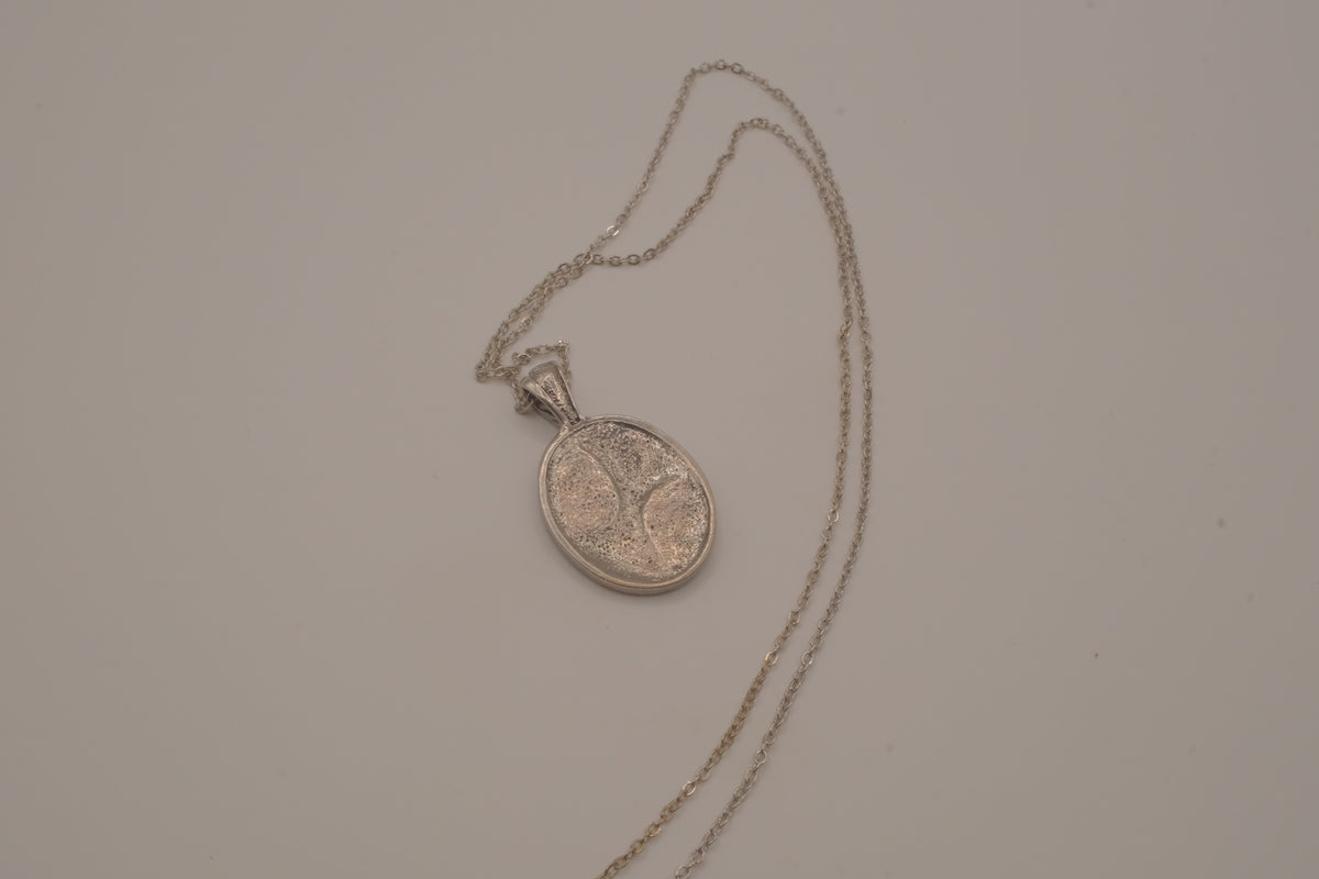Oval abalone shell and filigree scroll pendant necklace