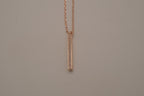 Rose gold vertical bar pendant necklace
