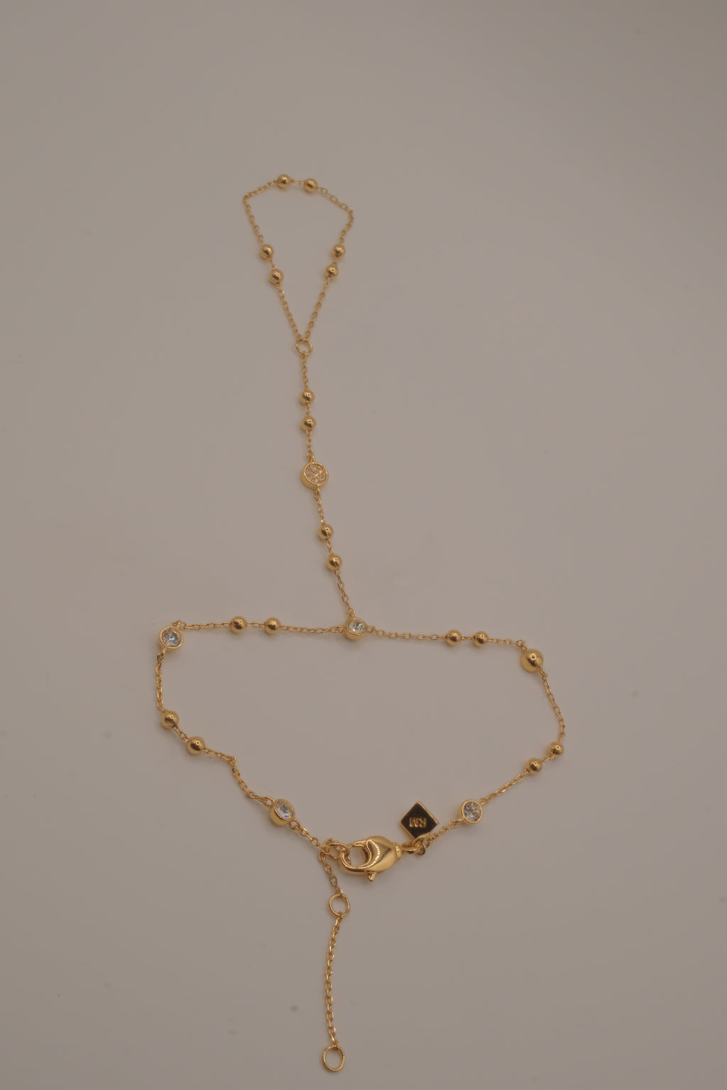 Ramy Brook Azzura Hand Chain in Gold tone