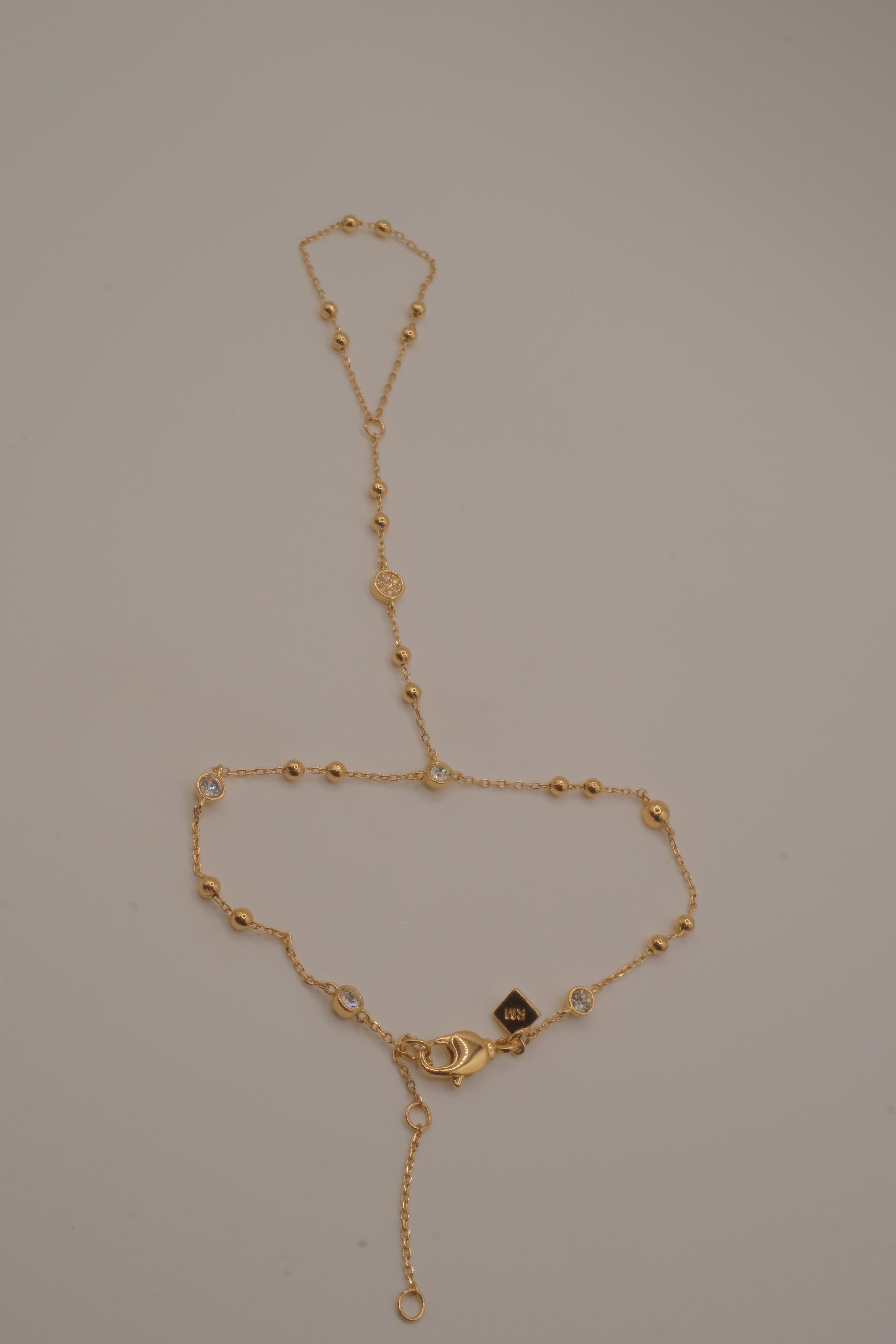 Ramy Brook Azzura Hand Chain in Gold tone