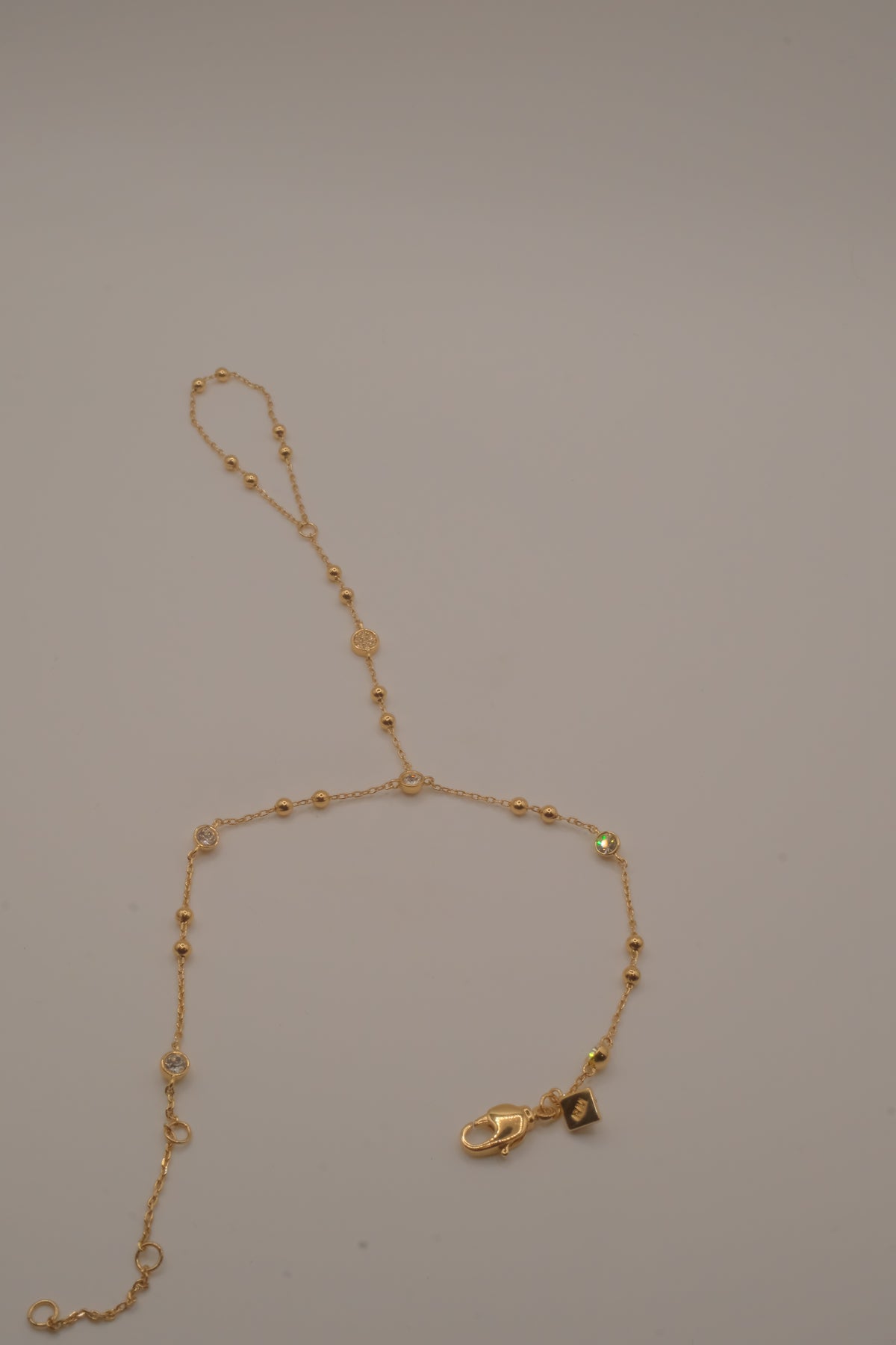 Ramy Brook Azzura Hand Chain in Gold tone