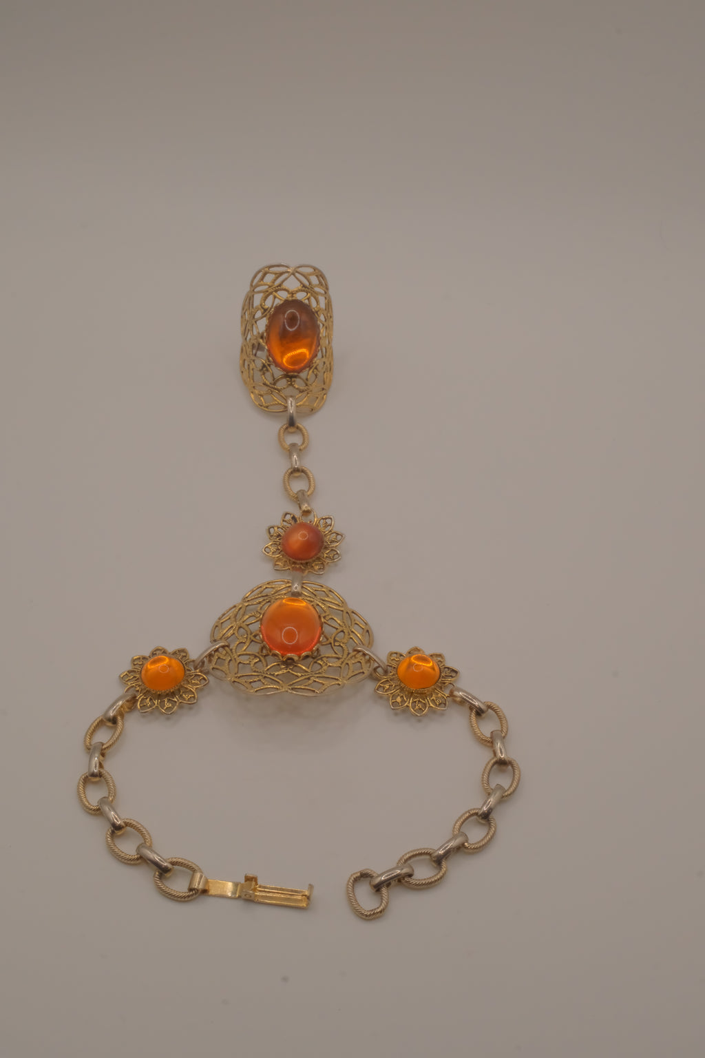 Vintage goldtone filigree hand chain bracelet
