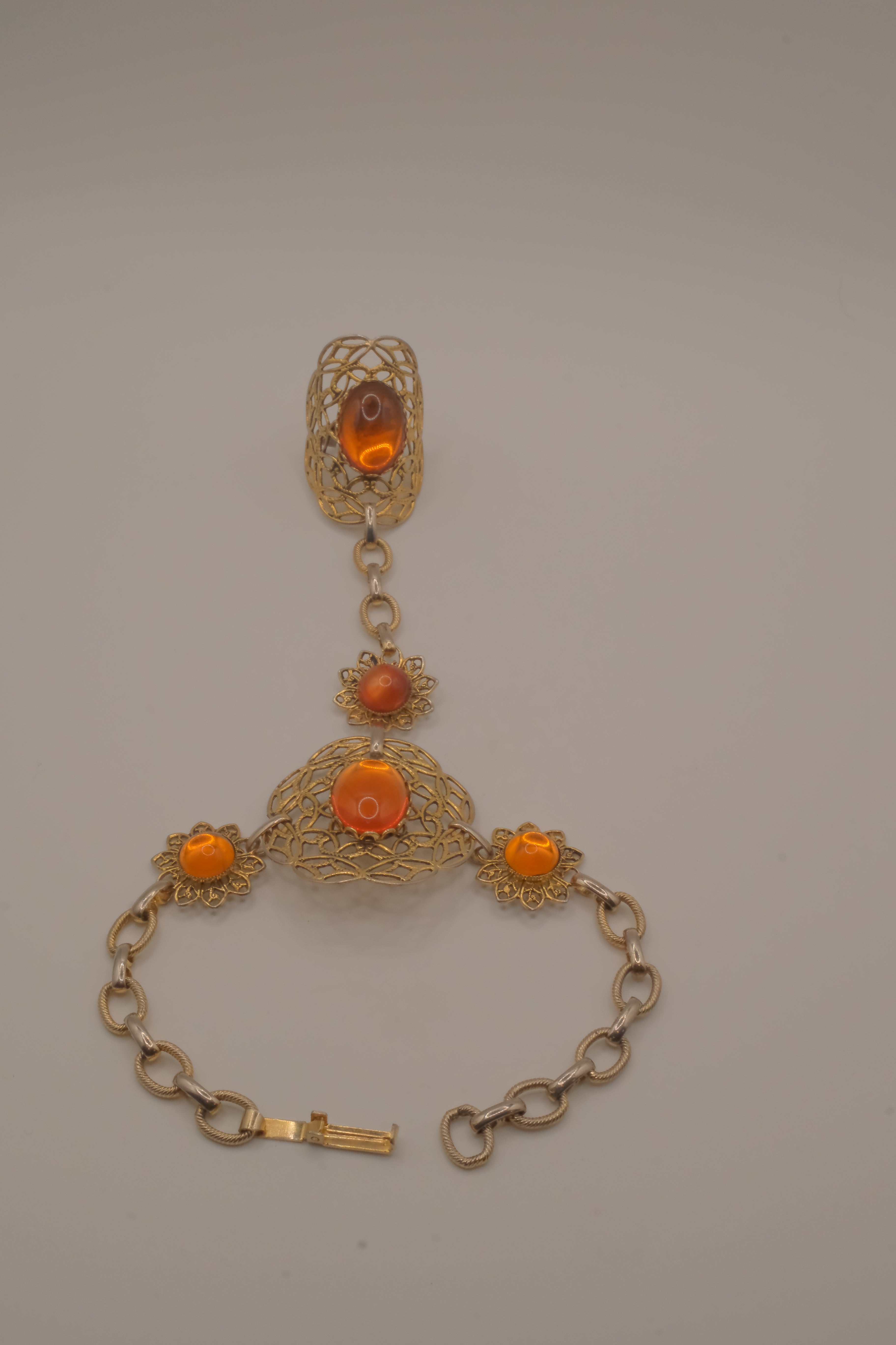 Vintage goldtone filigree hand chain bracelet