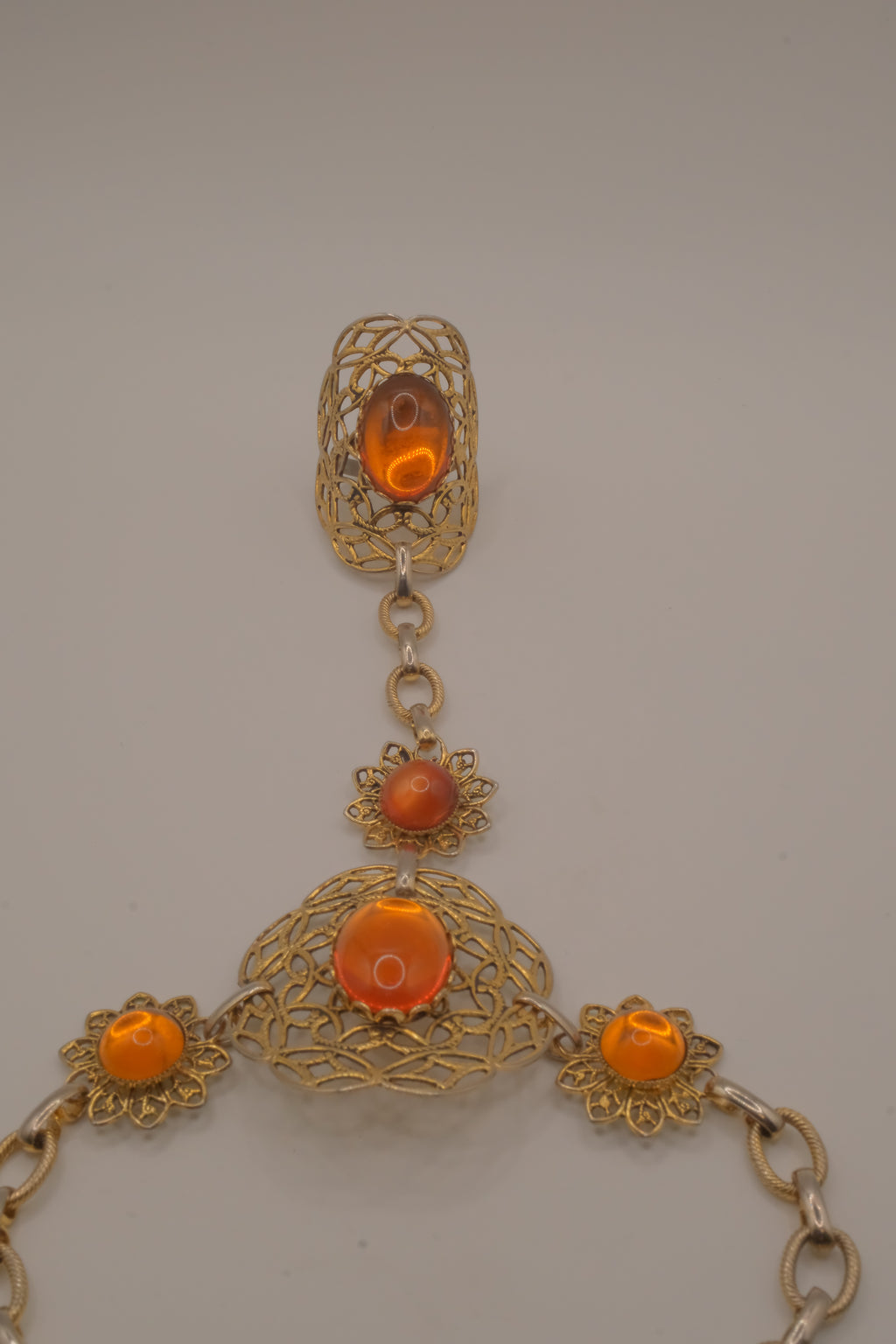 Vintage goldtone filigree hand chain bracelet