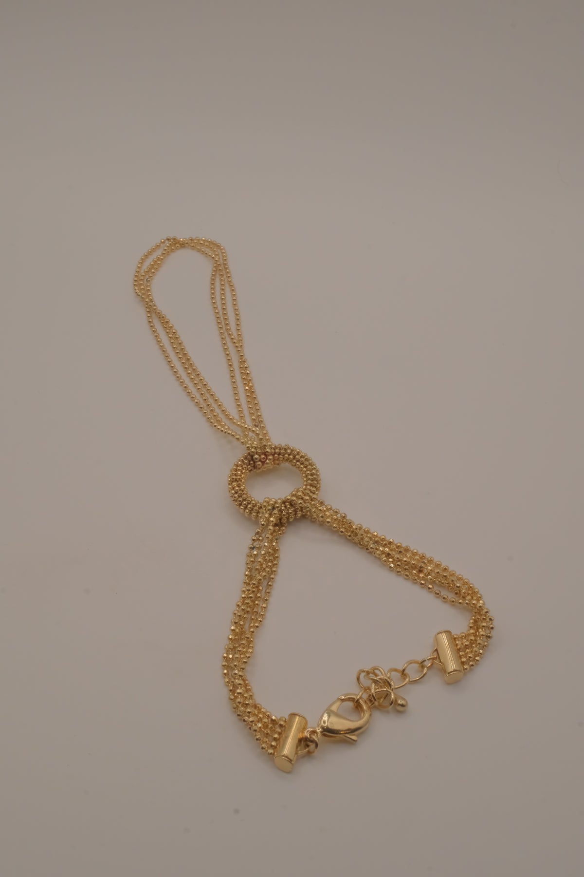 Gold multi-strand hand chain harness bracelet