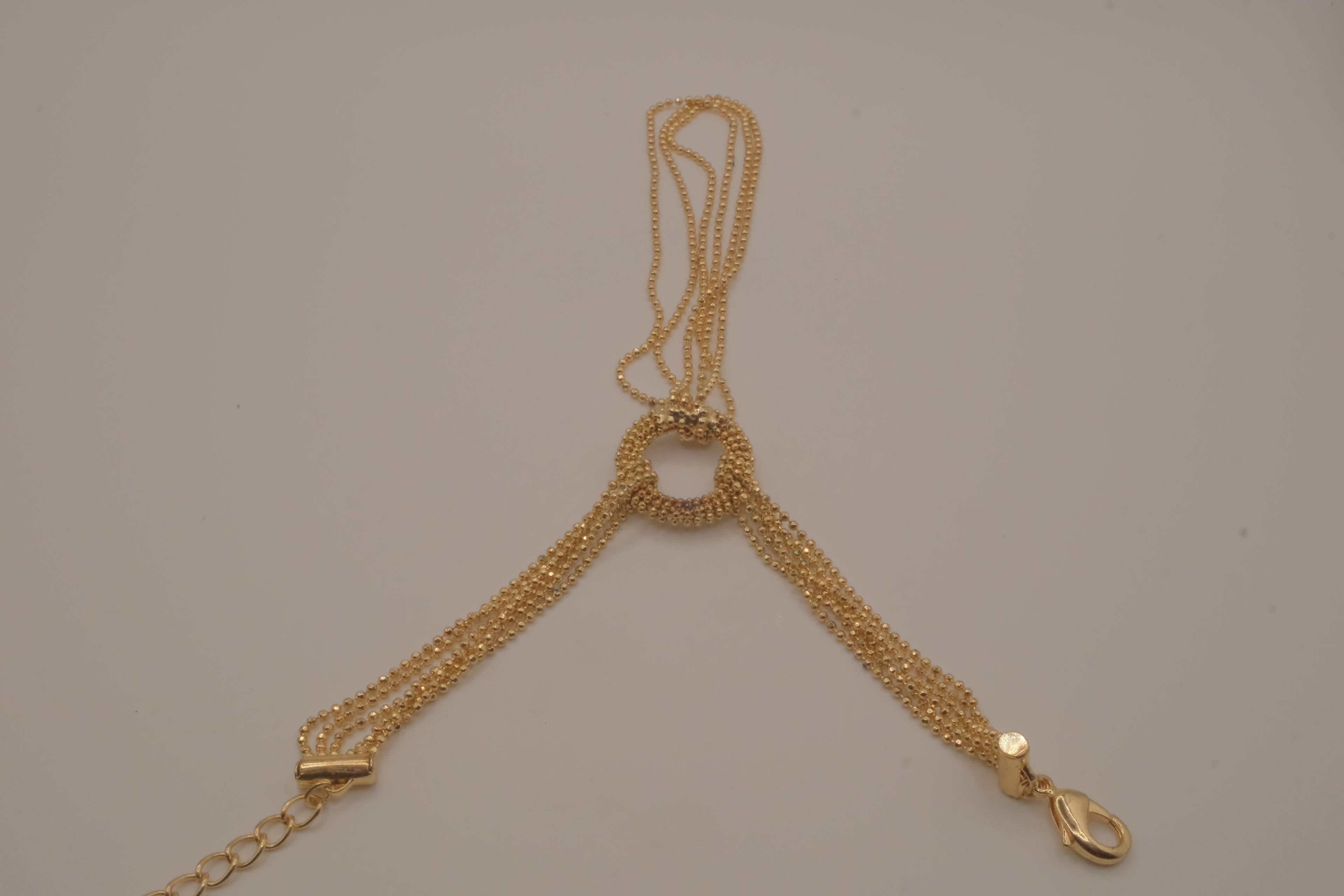 Gold multi-strand hand chain harness bracelet