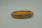 Antique-finish gold stone stone bangle