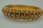 Antique-finish gold stone stone bangle