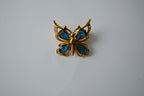 Vintage Butterfly brooch with blue crystals