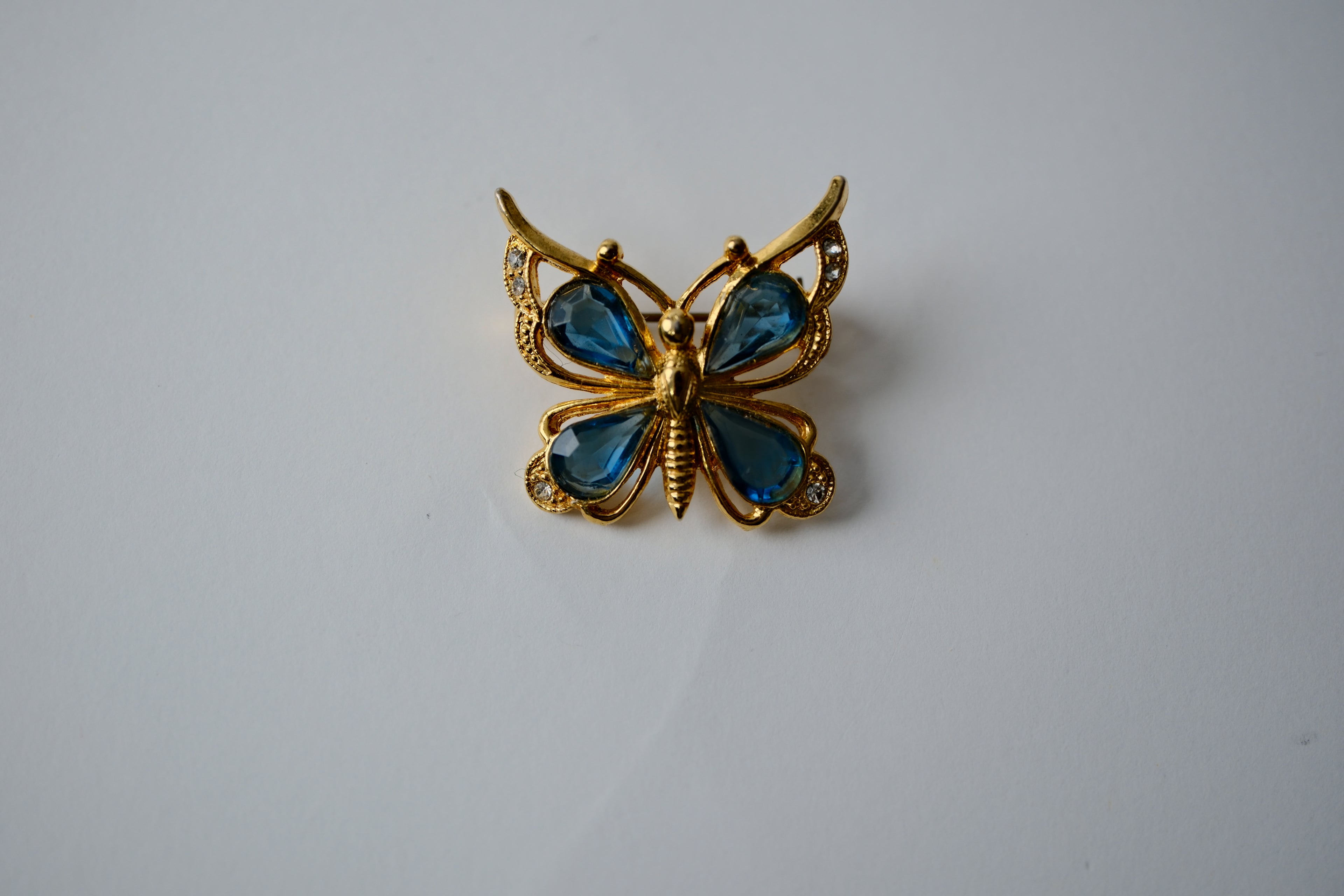 Vintage Butterfly brooch with blue crystals