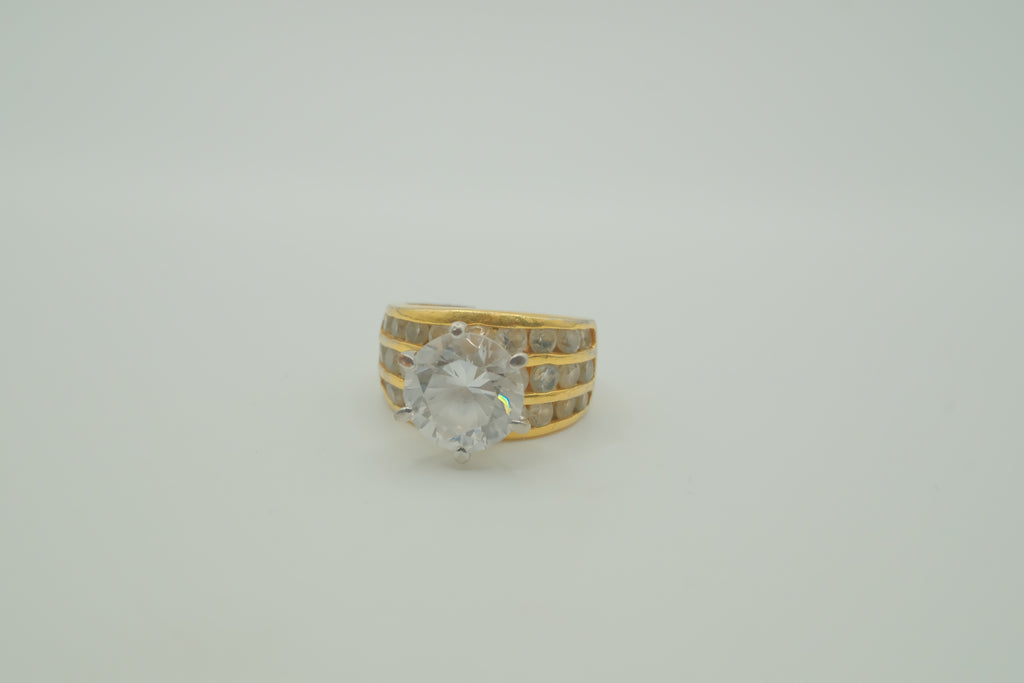 Multi-row channel-set solitaire ring