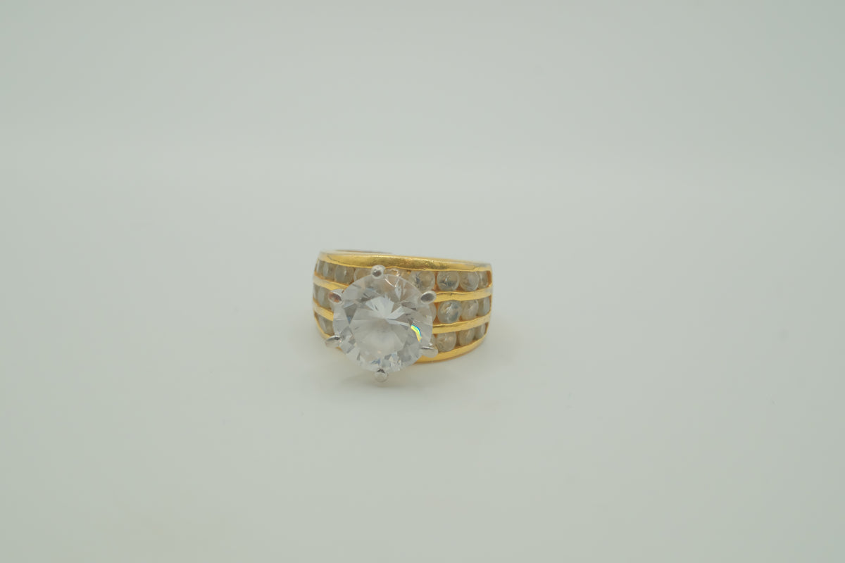 Multi-row channel-set solitaire ring