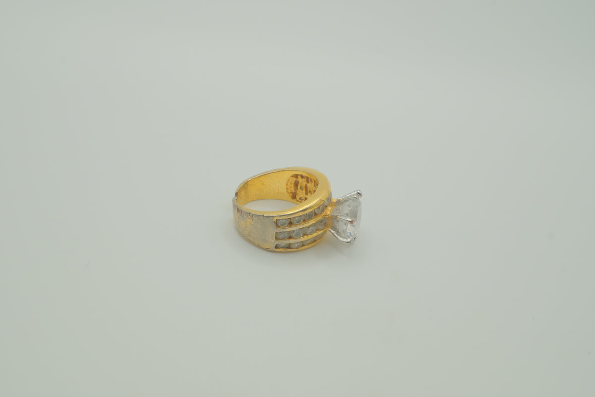 Multi-row channel-set solitaire ring