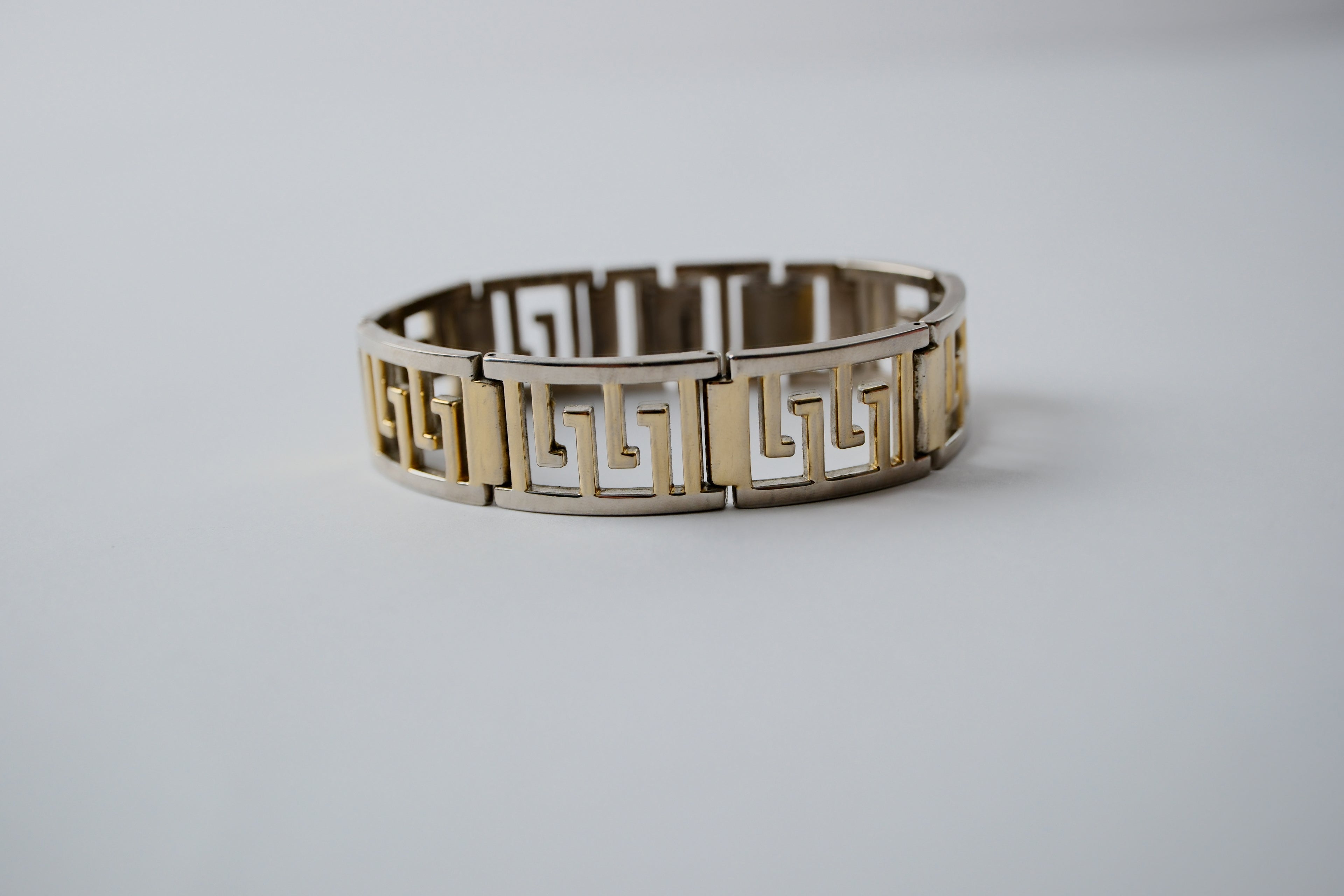 Two-tone Greek key pattern bracelet