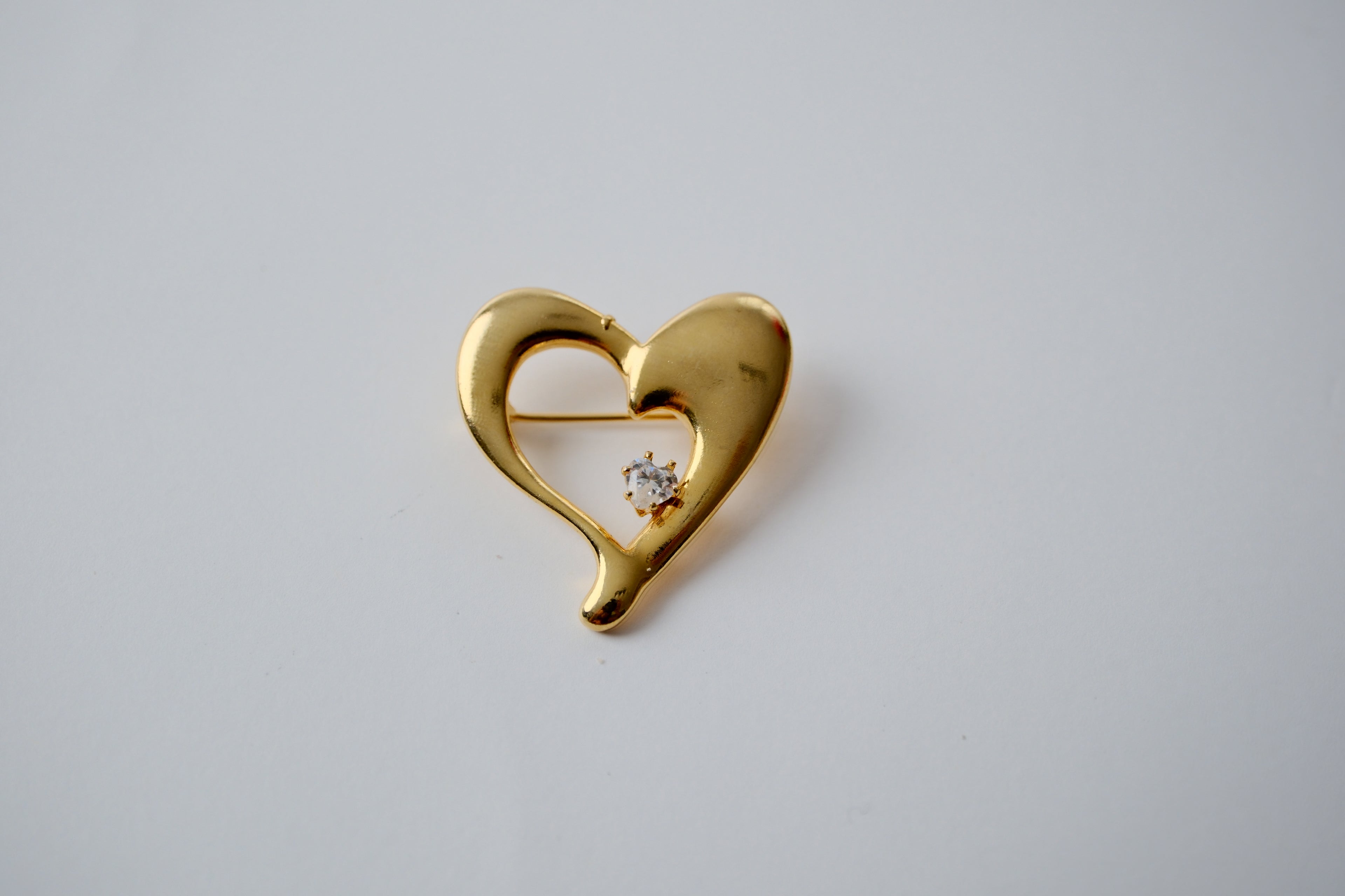 Heart-shaped Gold Toned brooch old-toned