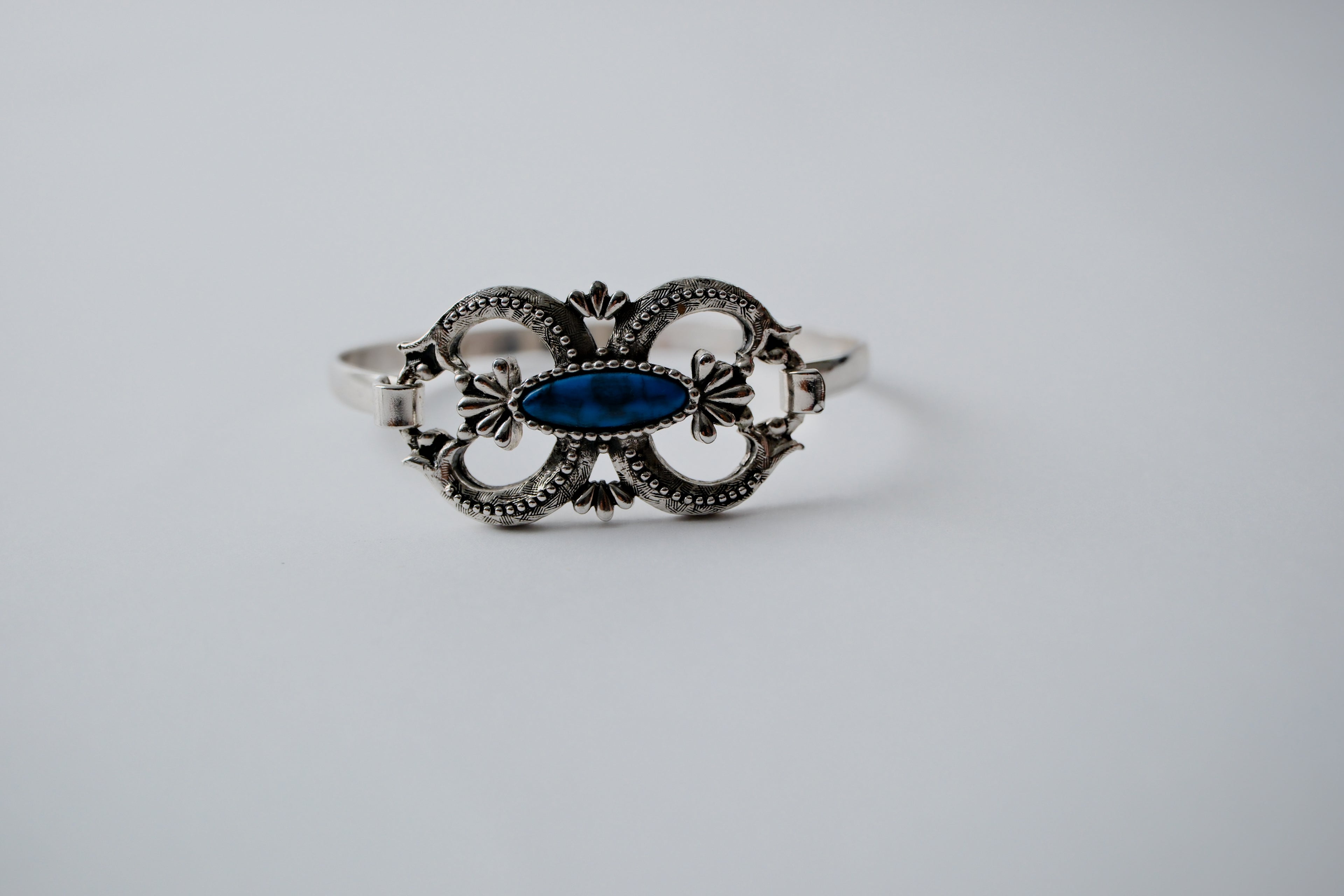 Blue Cloud design with faux turquoise and silvertone bangle