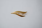 Vintage gold-toned leaf brooch