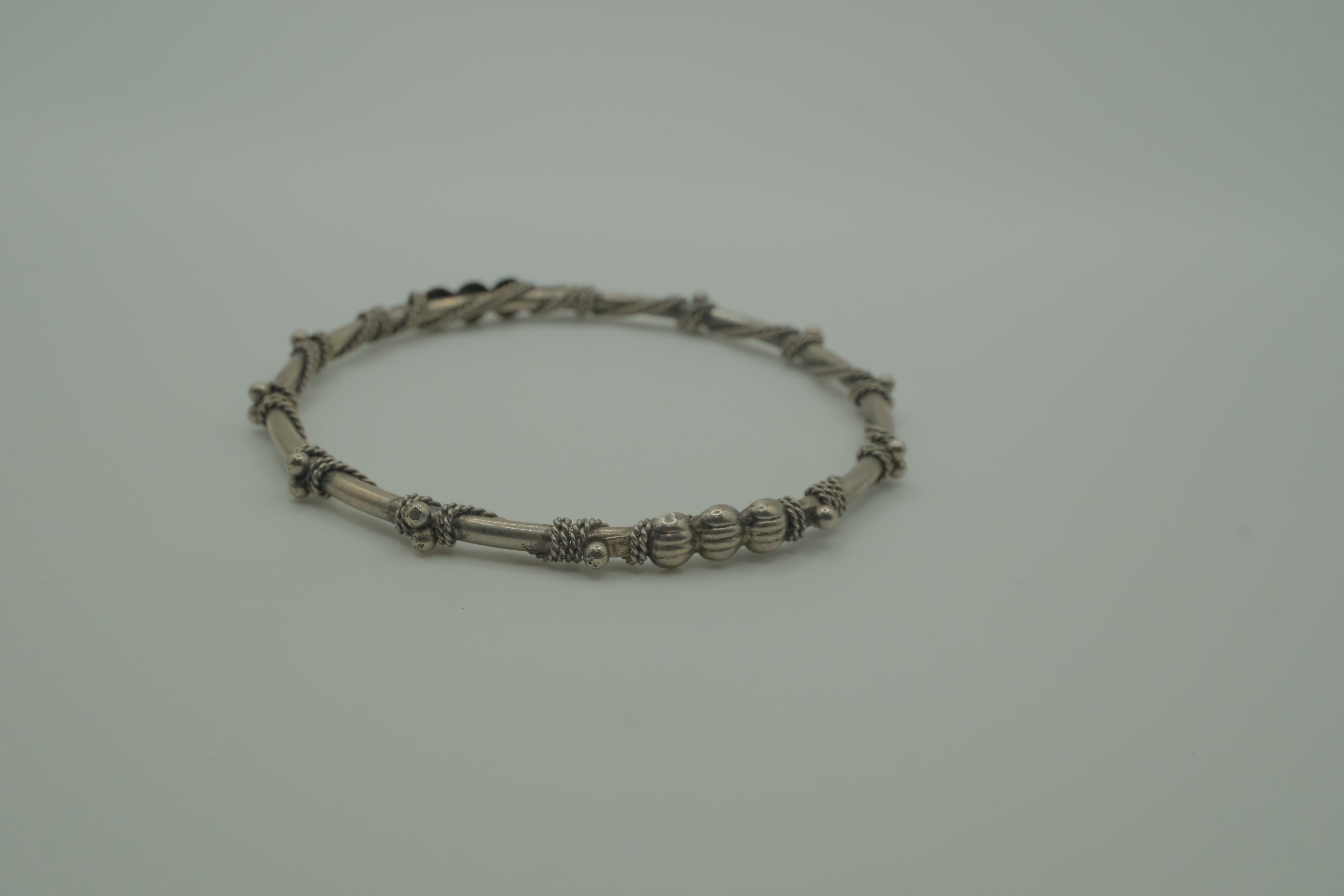 Vintage handcrafted silver-tone tribal bangle bracelet
