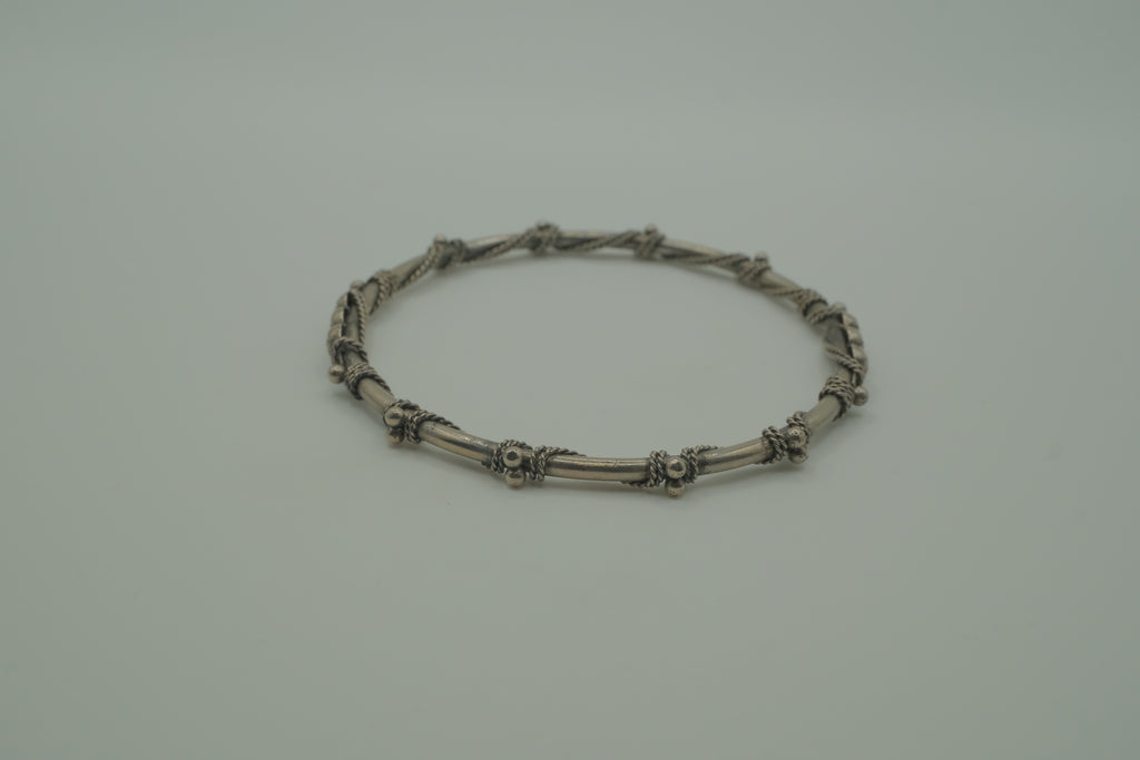 Vintage handcrafted silver-tone tribal bangle bracelet