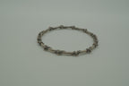 Vintage handcrafted silver-tone tribal bangle bracelet