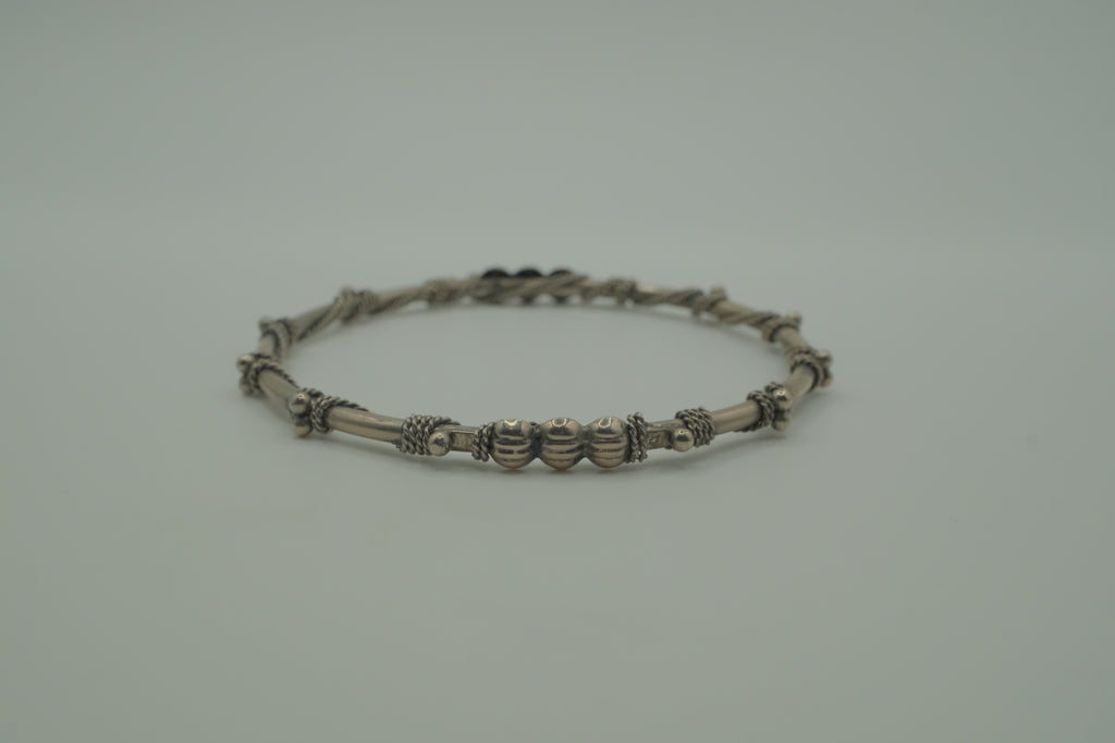 Vintage handcrafted silver-tone tribal bangle bracelet