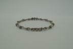 Vintage handcrafted silver-tone tribal bangle bracelet