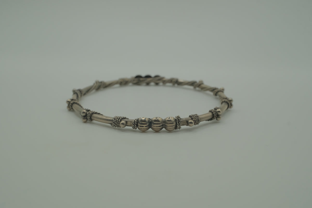 Vintage handcrafted silver-tone tribal bangle bracelet