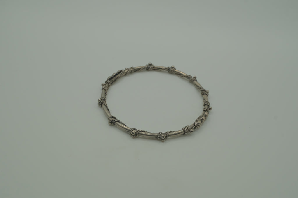 Vintage handcrafted silver-tone tribal bangle bracelet