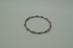 Vintage handcrafted silver-tone tribal bangle bracelet