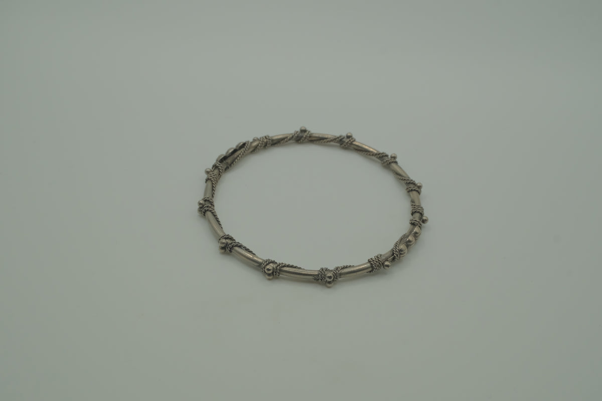 Vintage handcrafted silver-tone tribal bangle bracelet