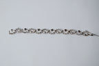 Vintage silver-tone bracelet with leaf design and rhinestones