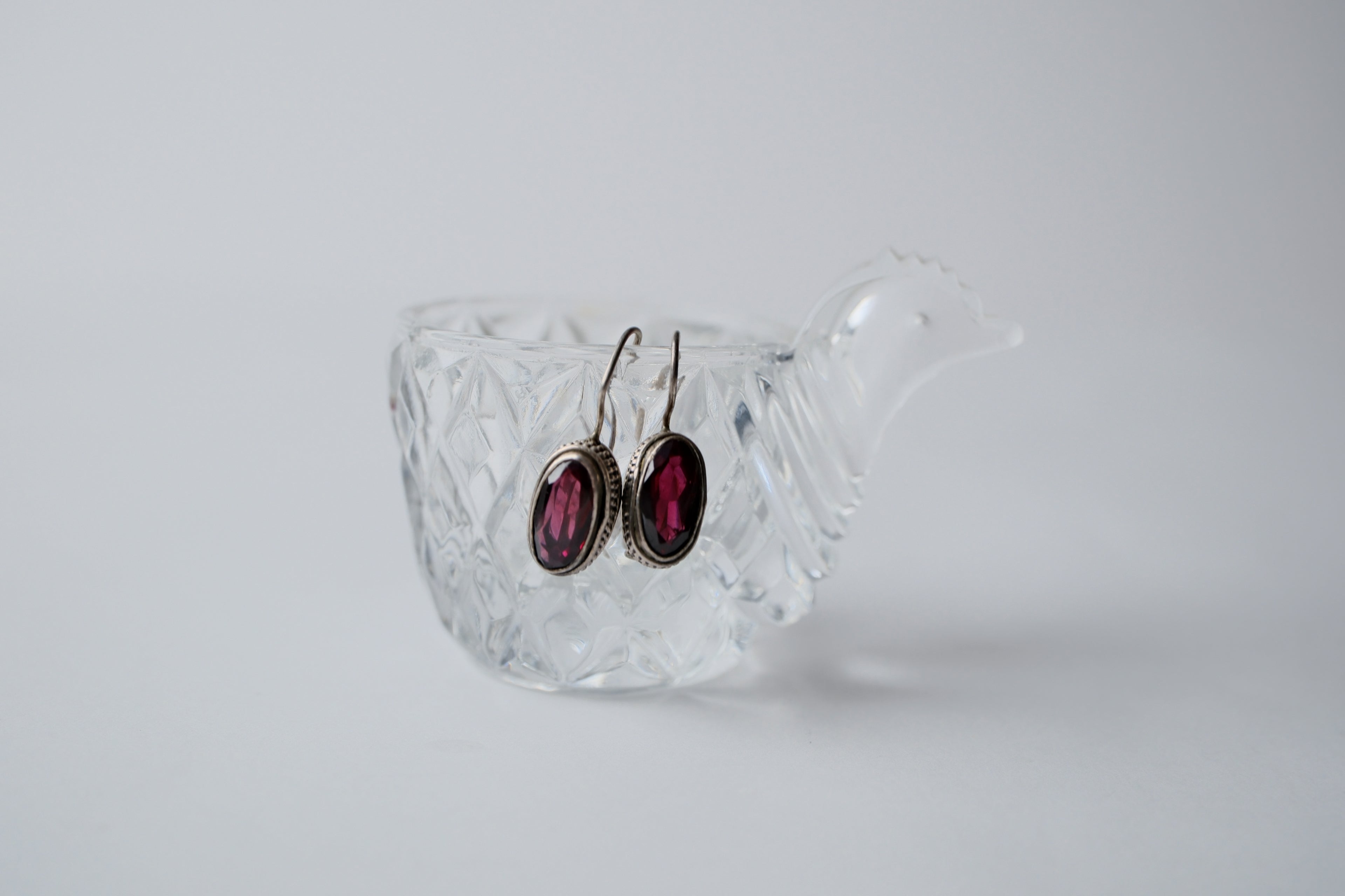 Sterling silver oval cut garnet earrings