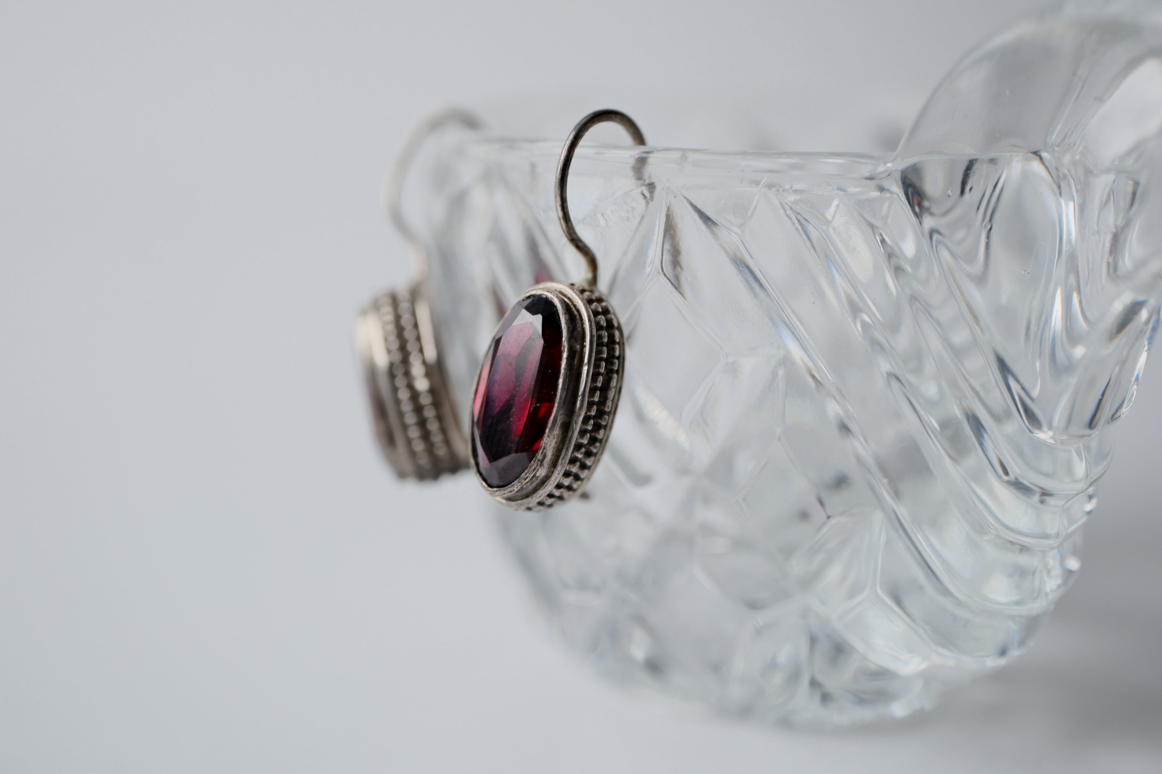 Sterling silver oval cut garnet earrings